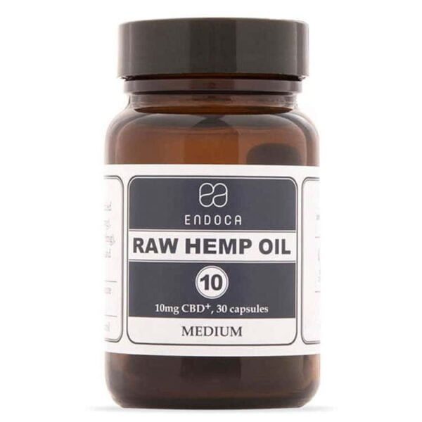 a bottle of raw hemp oil on a white background.