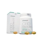 A box and bottle of Cibdol 40% CBD softgel capsules, containing 60 pieces with each capsule holding 66.6 mg, with some capsules visible in the foreground.